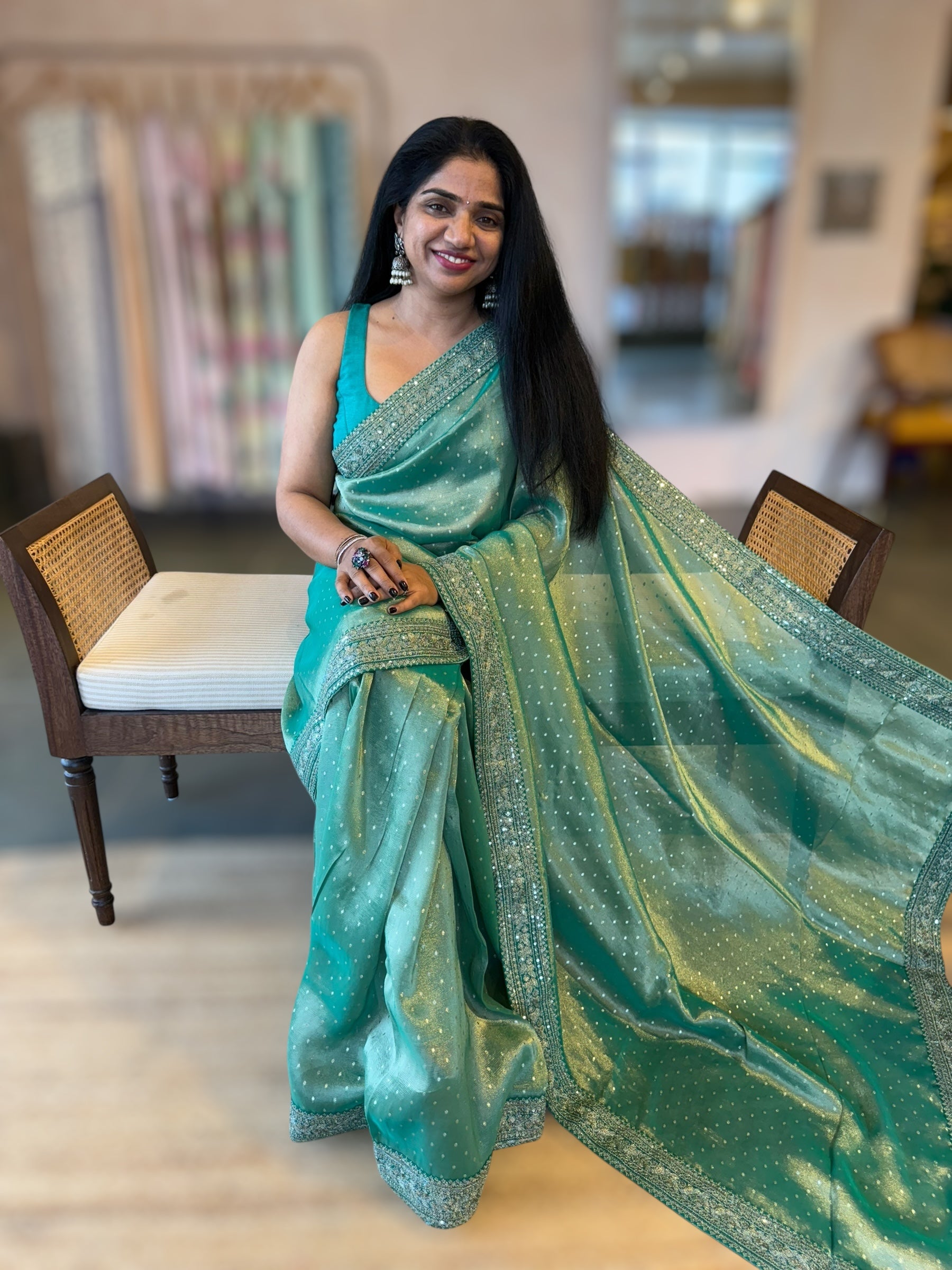 Teal Tissue Gorgette saree with sabyasachi borders and allover pitawork blouse