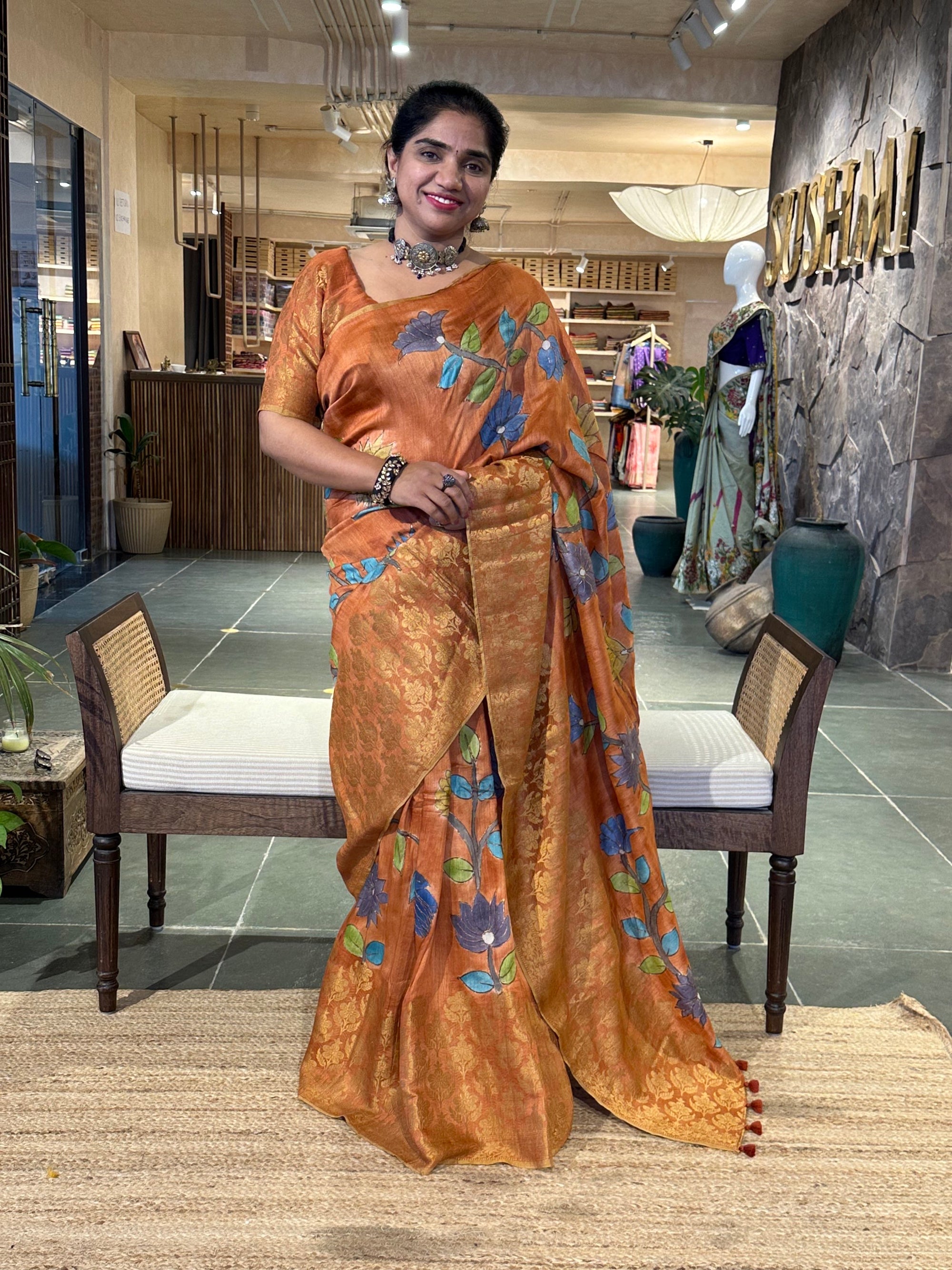 Rust Orange Pure Handloom Munga Banarasi Saree with pichwai handpainting .