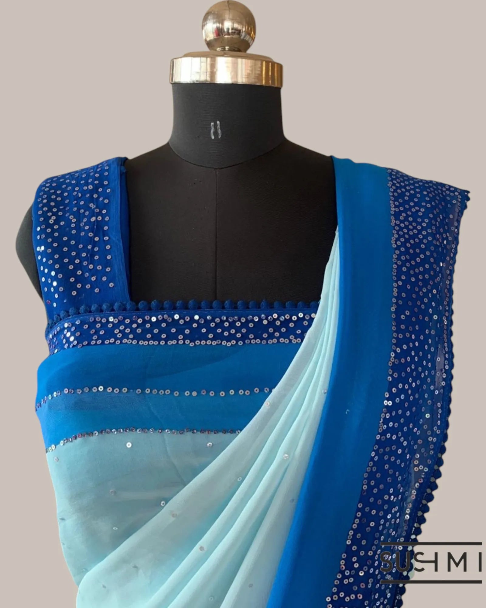 Pastel Blue Pure Gorgette Saree With Shaded Sequnce Border