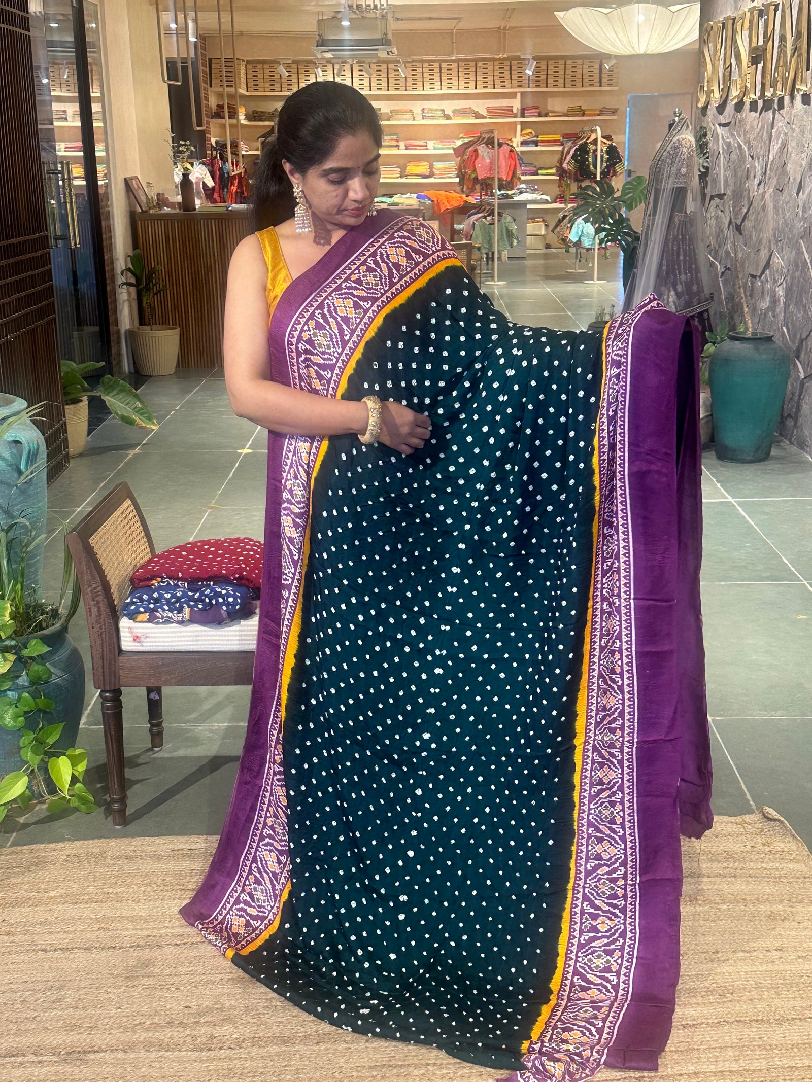 Modal satin Bandhej saree with patola printed border and pallu