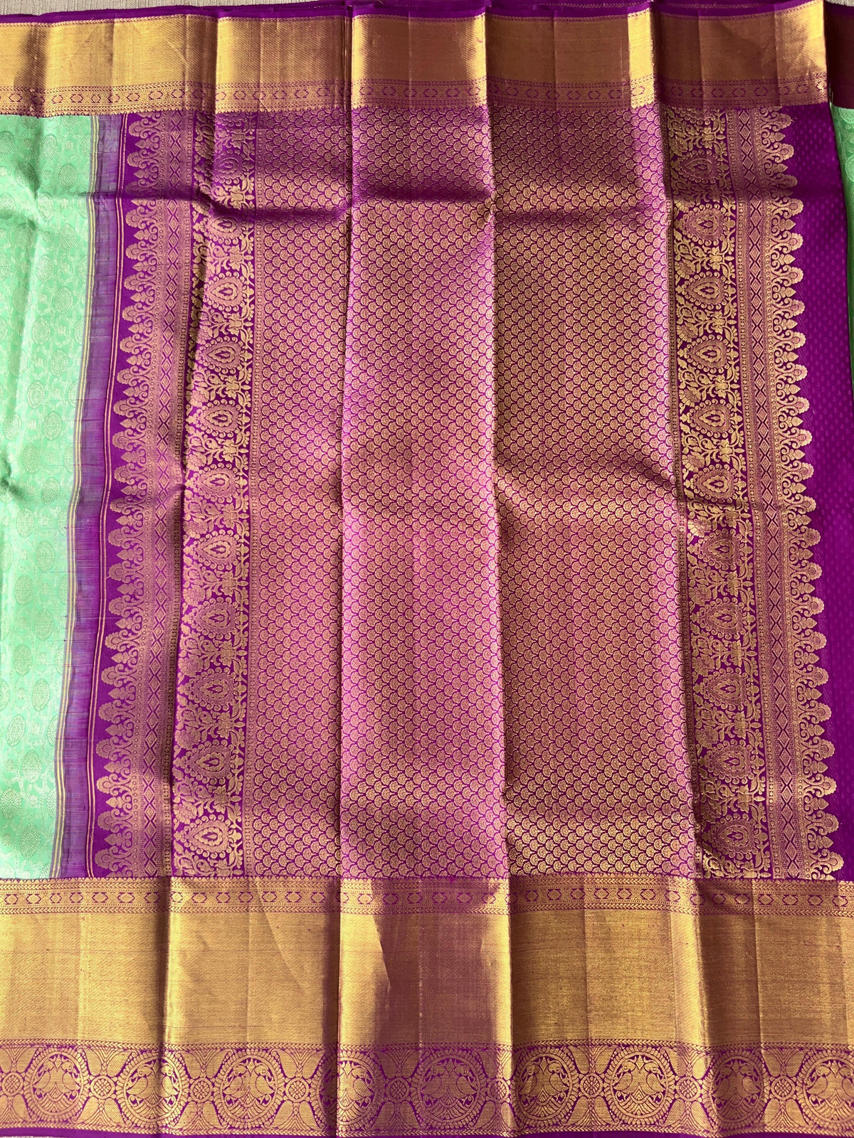 Mint Green Kanchi Pattu Brocade Saree with Rich Purple Zari Border & Pallu