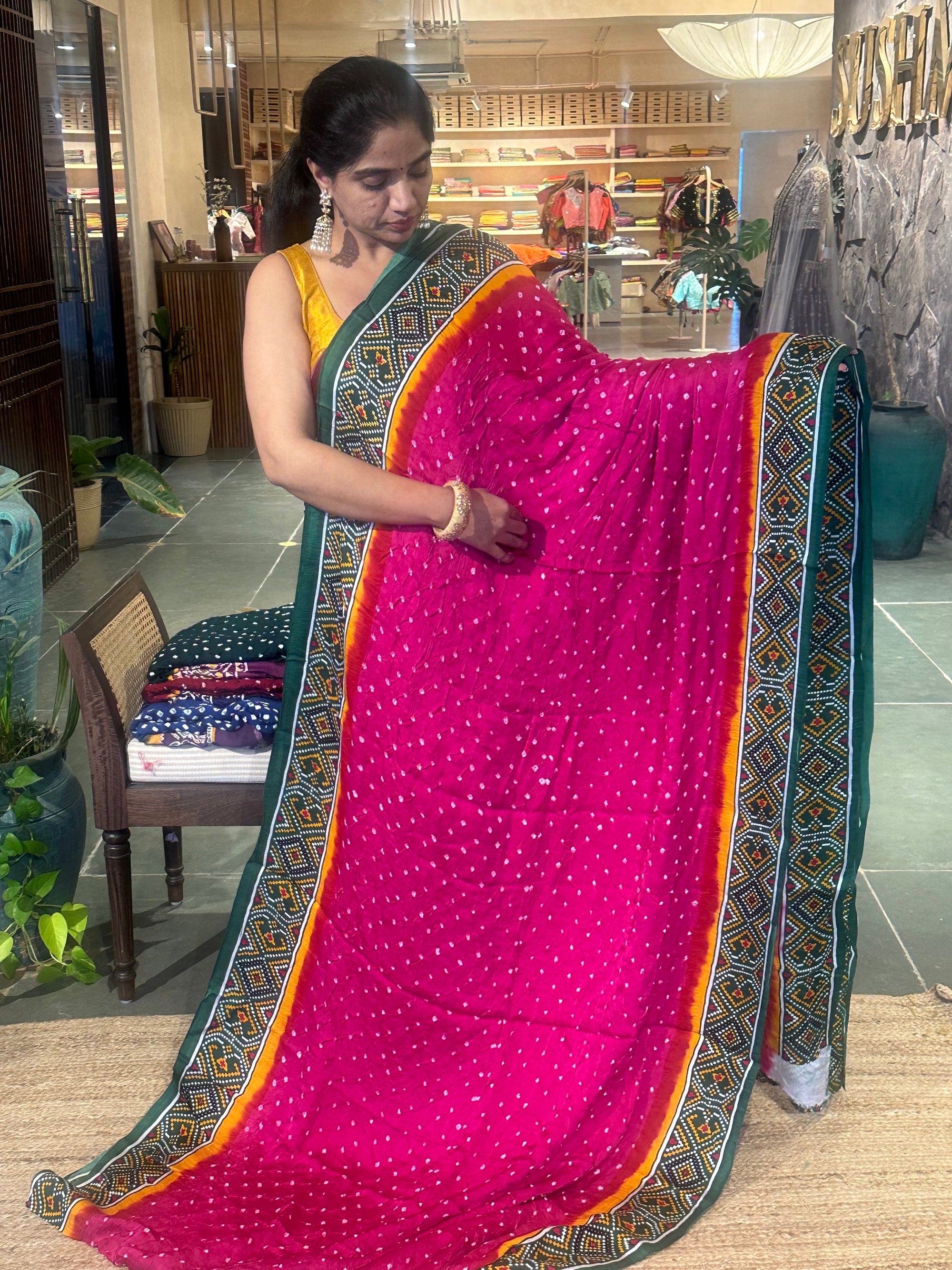 Modal satin Bandhej saree with patola printed border and pallu