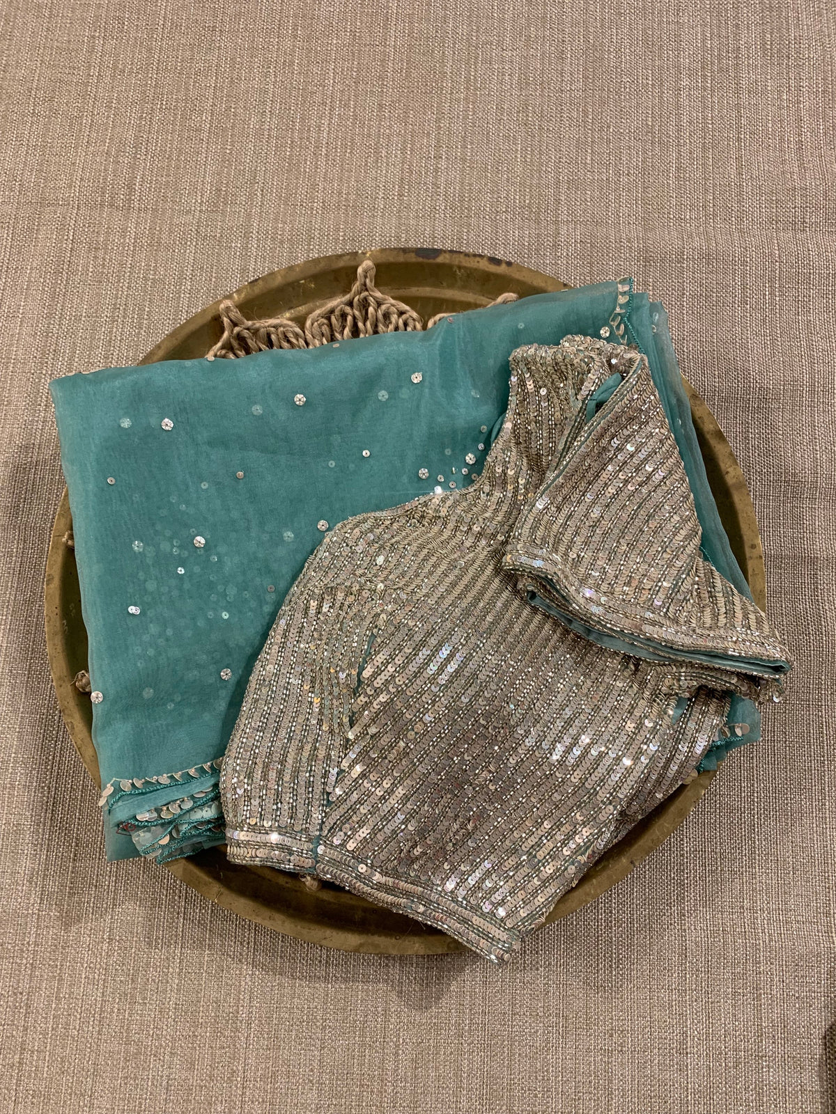 Sea Green Organza Saree with allover work and paired with heavy blouse