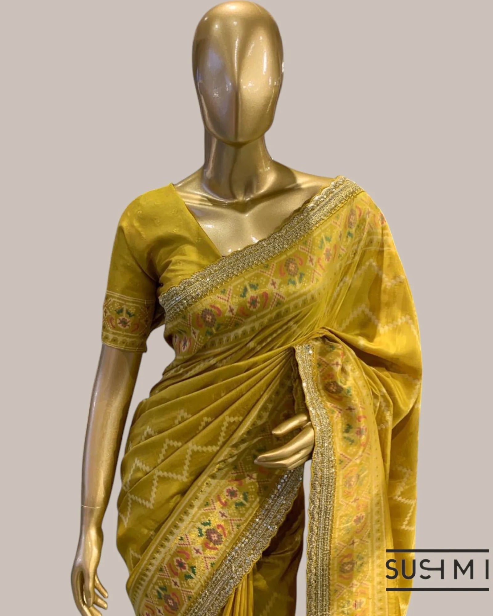 Mustard Tussar Silk Gorgette Saree in Ikkath Patola style Chevron body and Patol