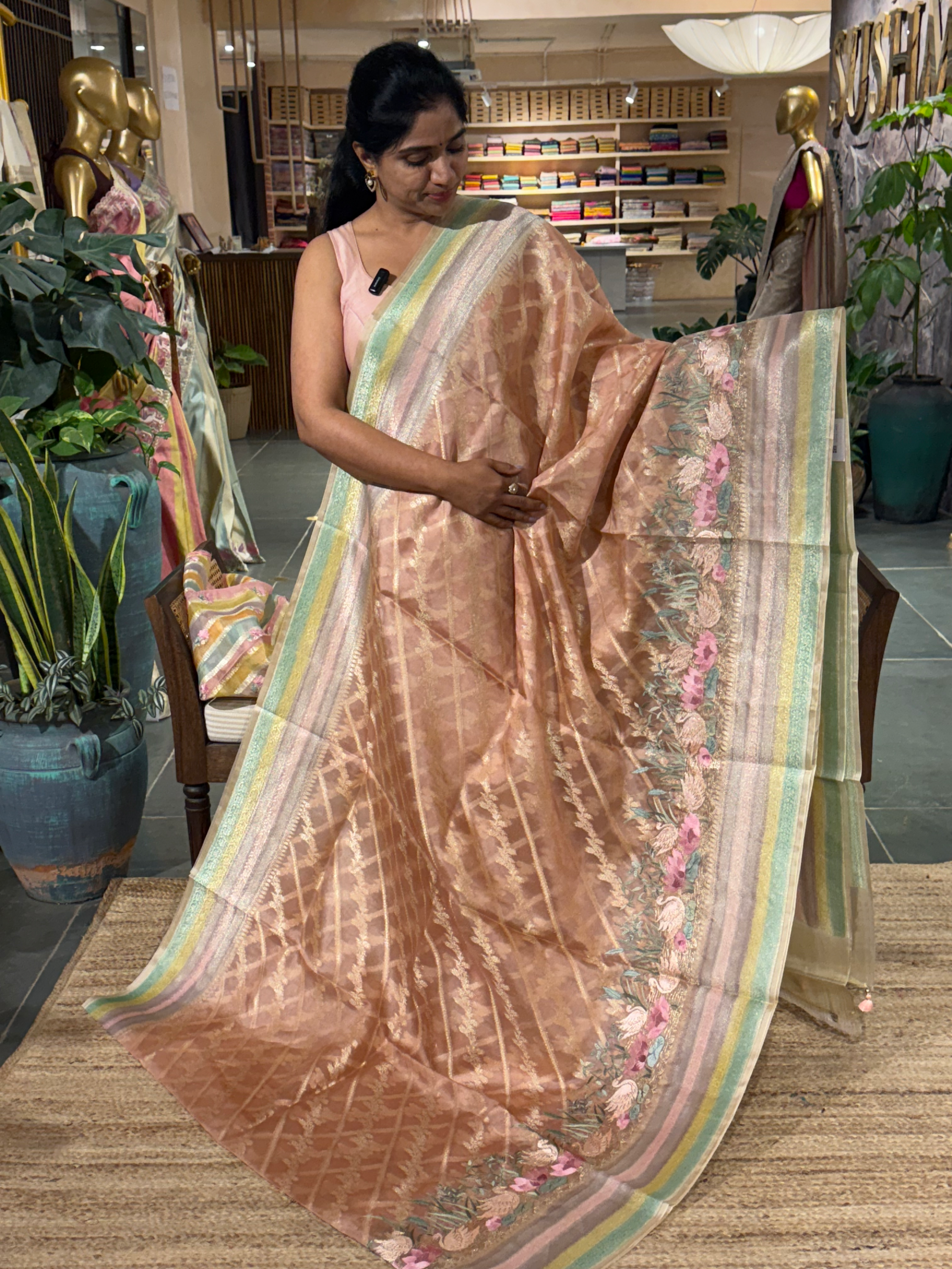Pure Handloom Kora Banarasi with rangkaat and embroidered borders and blouse.