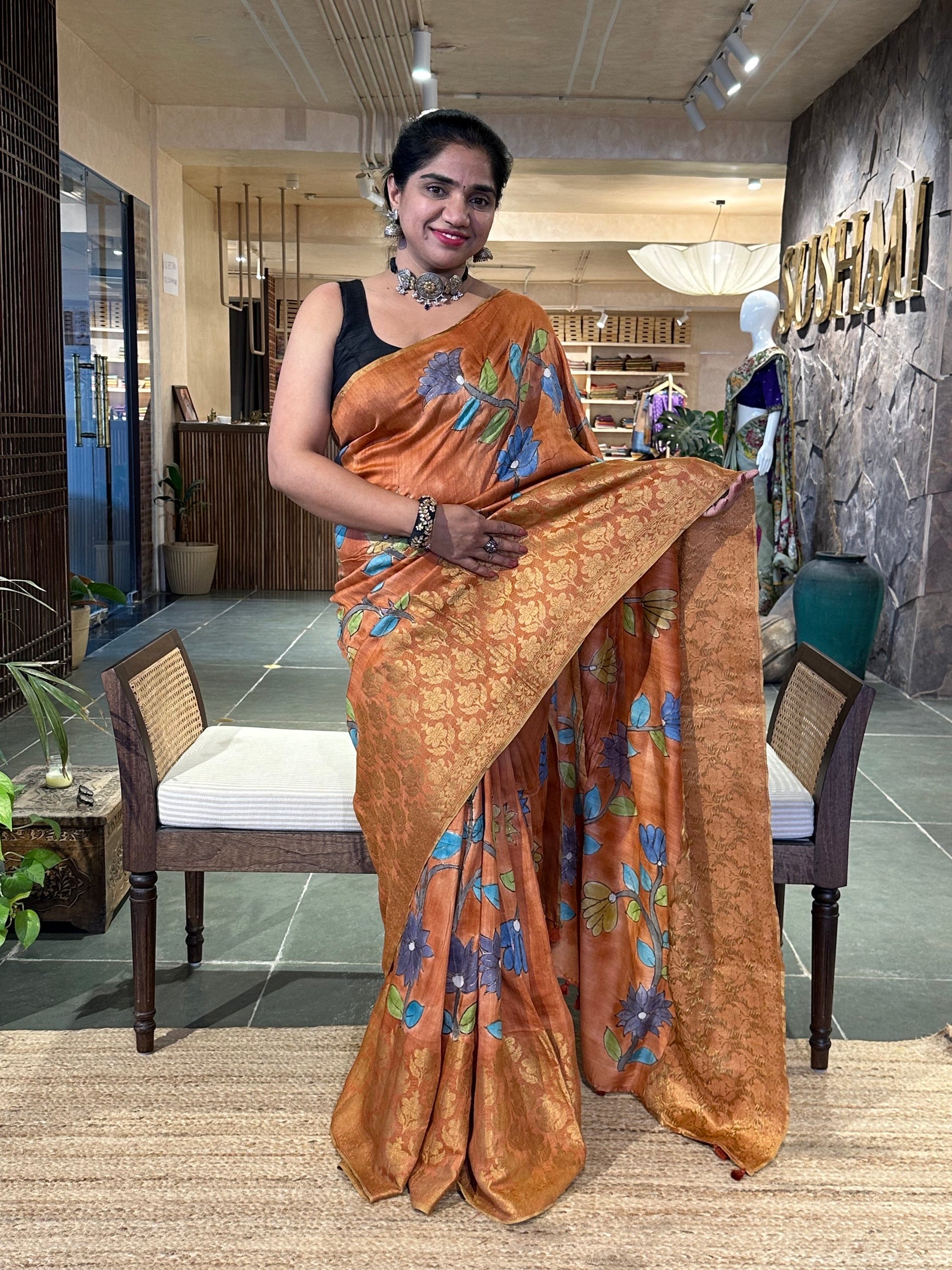 Rust Orange Pure Handloom Munga Banarasi Saree with pichwai handpainting .