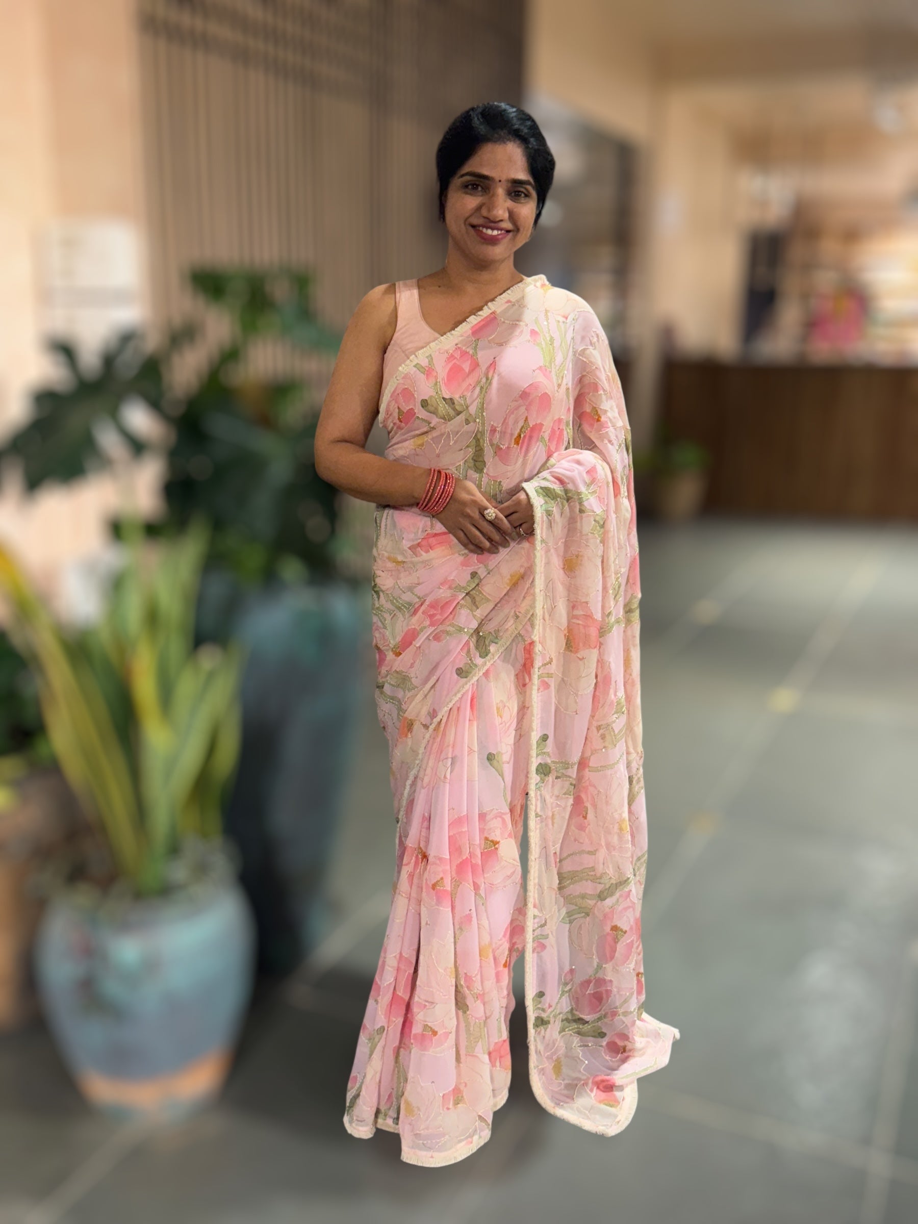 Pastel Pink Pure Gorgette Printed Saree With Allover Hand Done Katha work