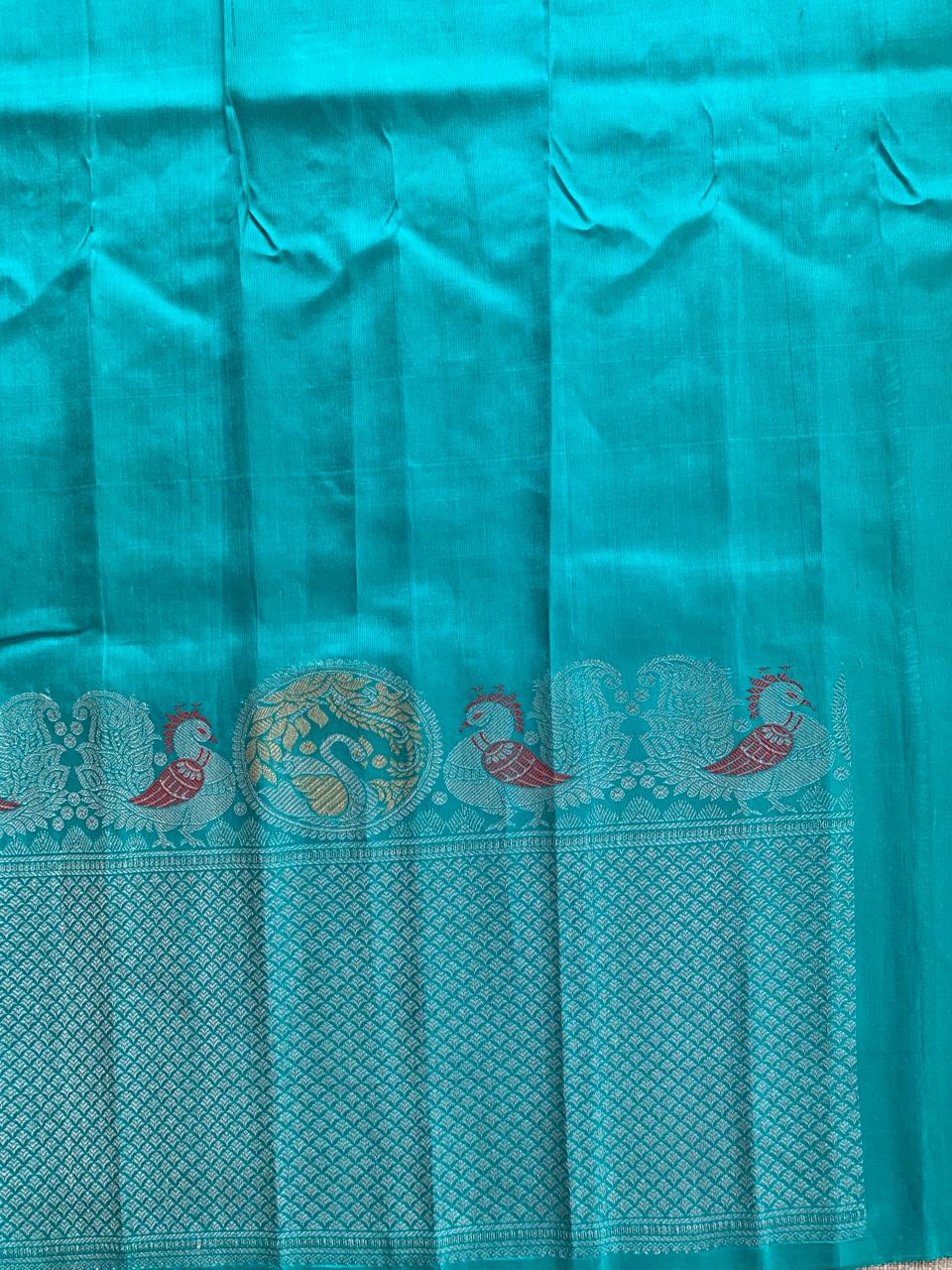 Teal Pure Handloom Gadwal Saree Turning Borders
