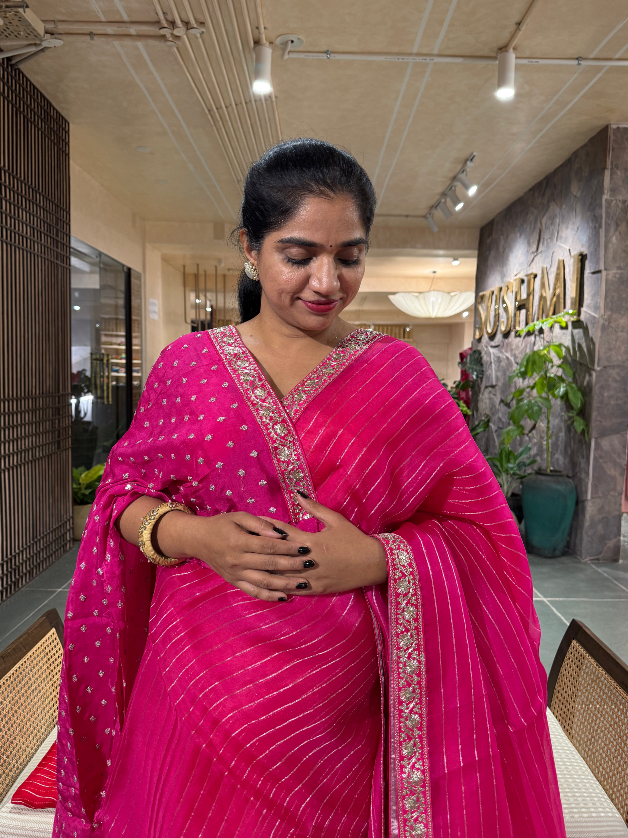 SOSSM2902  Fuschia Pink Organza Silk  Saree hemlined with Sabhyasachi Borders