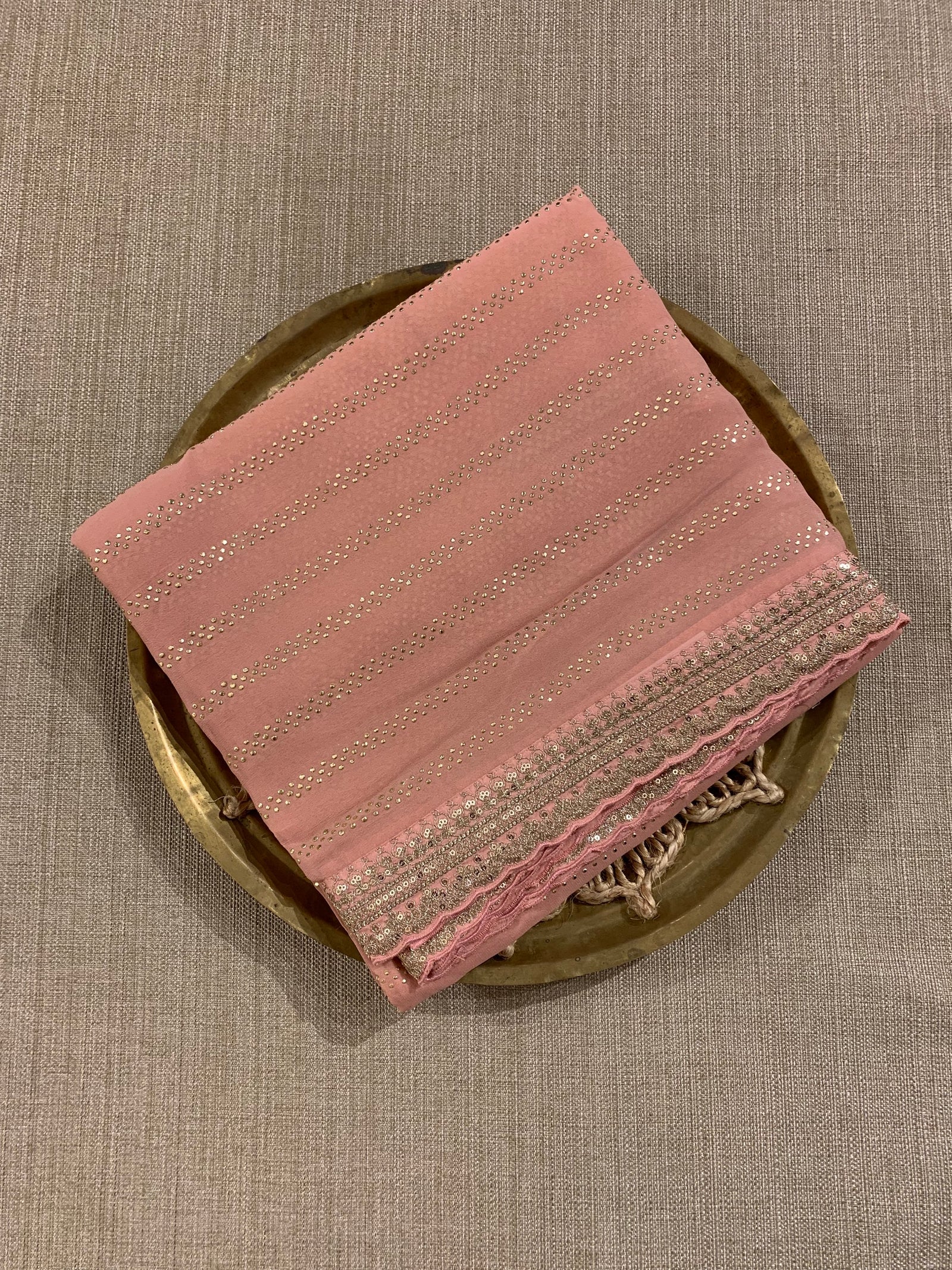 Salmon Pink Pure gorgette Saree with allover bead work  & sabyasachi borders
