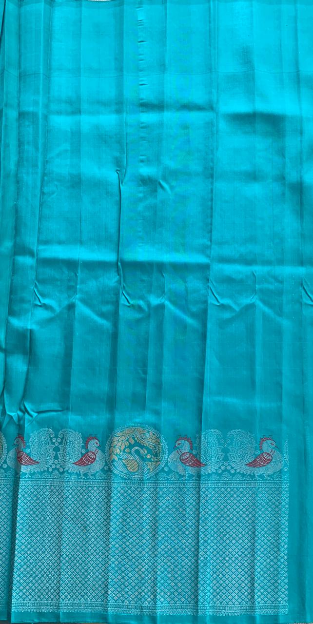 Teal Pure Handloom Gadwal Saree Turning Borders