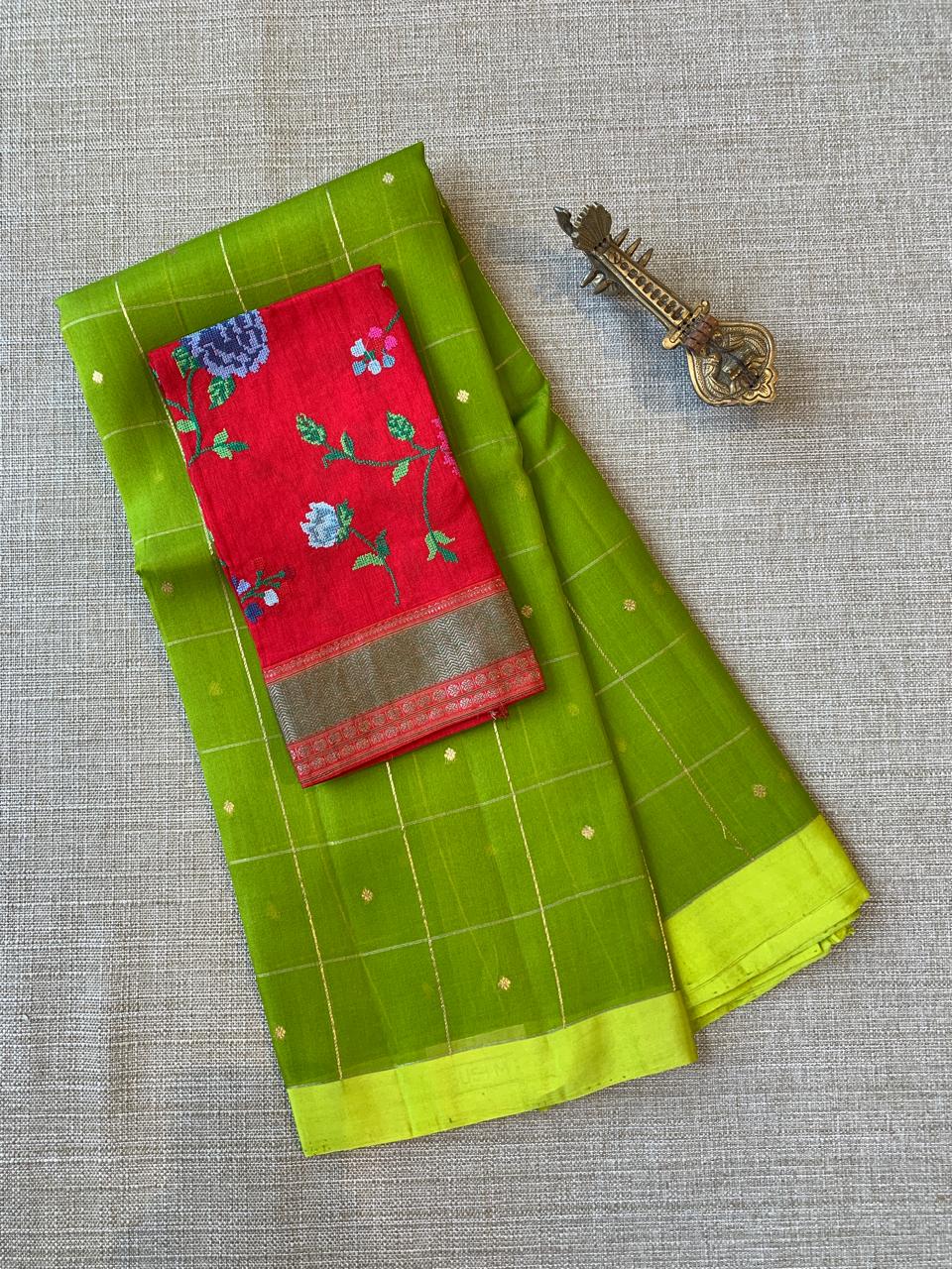 Parrot Green Handloom Banarasi Kora Checks Saree with Kaduwa Woven Zari Motifs .