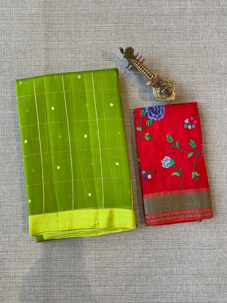 Parrot Green Handloom Banarasi Kora Checks Saree with Kaduwa Woven Zari Motifs .
