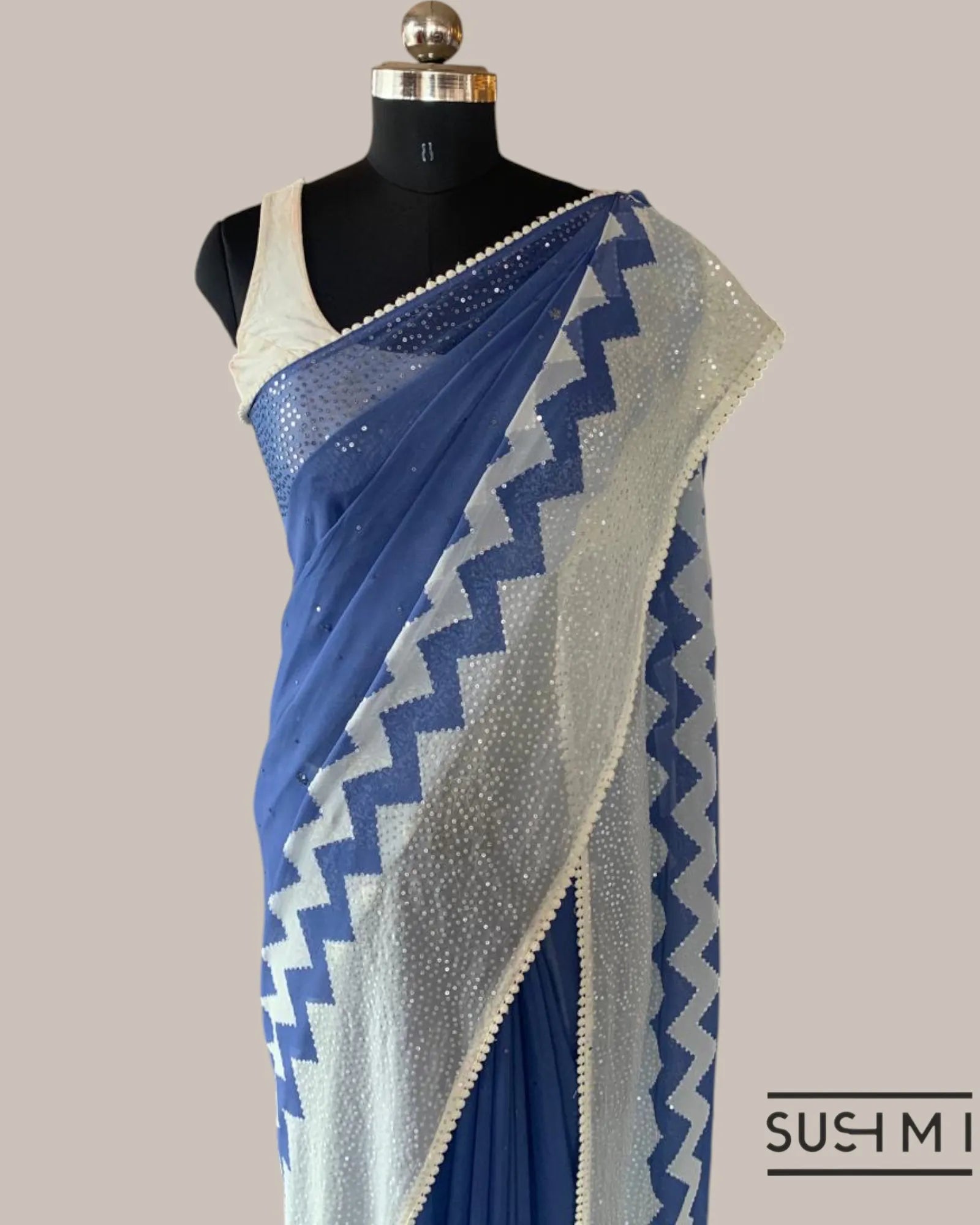 Blue Pure Gorgette Saree With Zigzag Pattern Sequnce Border