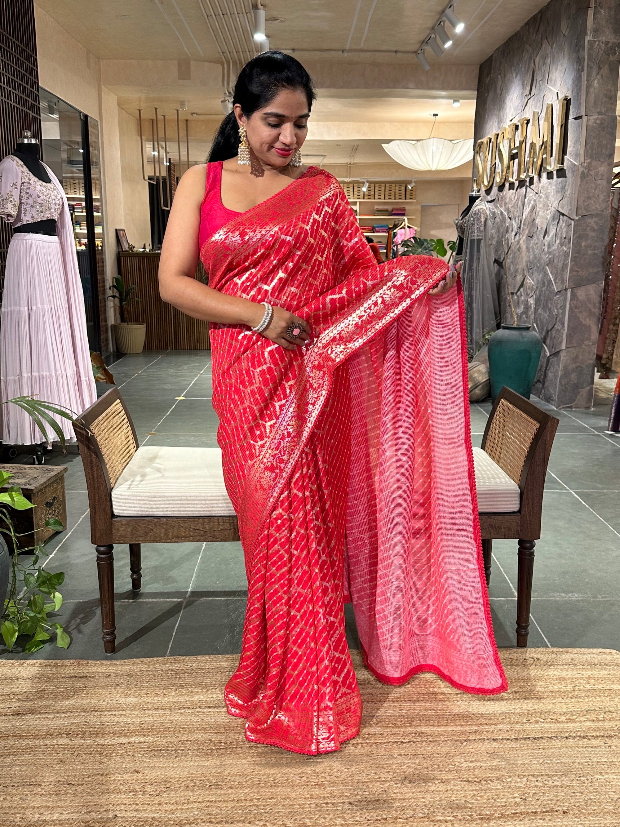 Pinkish Red Pure Gorgette Lehariya Bandhini Sequnce Saree