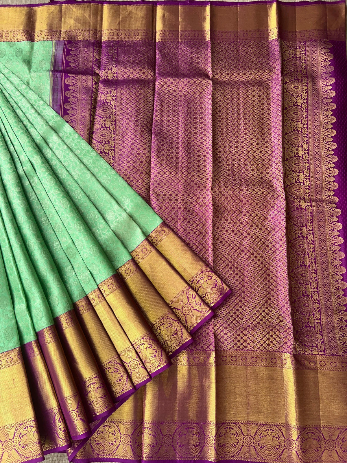 Mint Green Kanchi Pattu Brocade Saree with Rich Purple Zari Border & Pallu